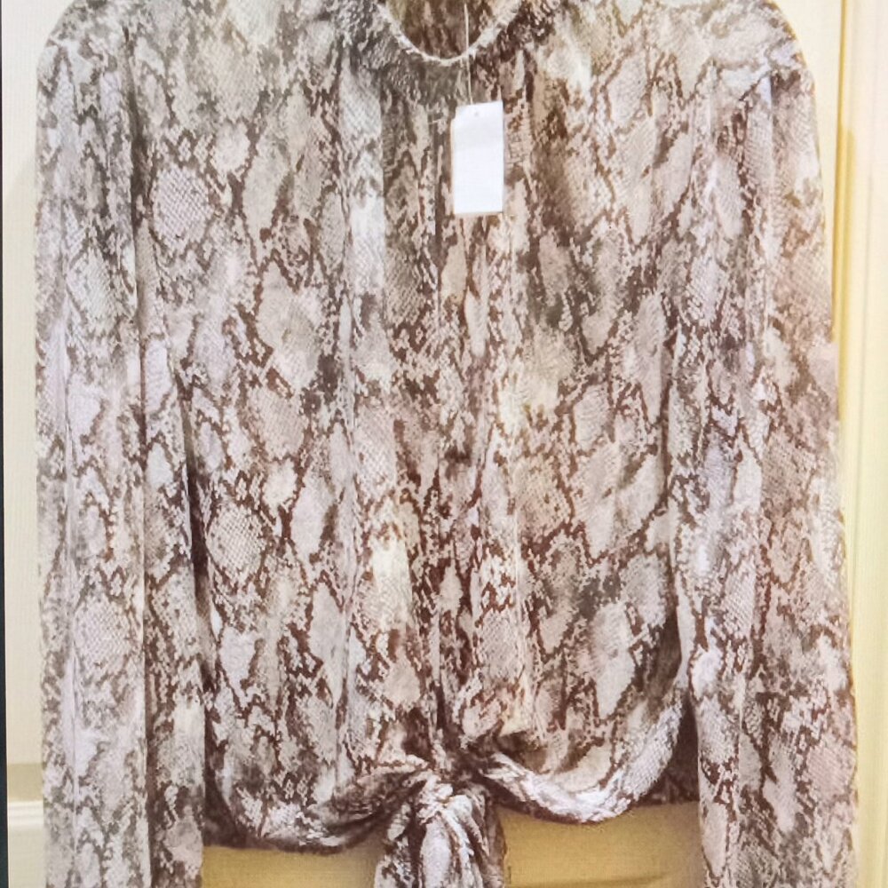 FRAME Denim Peplum Tie Blouse in a snake print pattern.